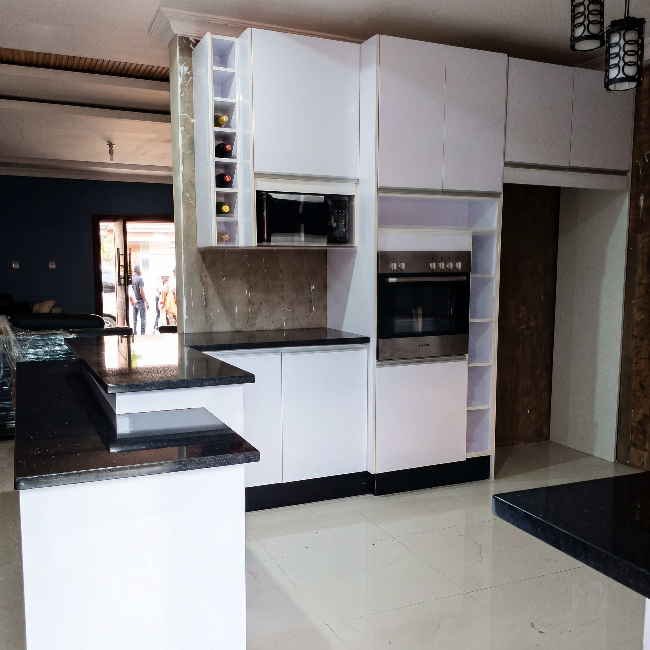 White Cabinetry with Granite Bar